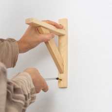 Comment fixer une charge lourde dans un mur creux ?