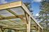 Carport en bois thermochauffé THONES 18,93 m² avec toit plat polycarbonate, Livraison à domicile incluse - HABRITA