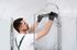 Fixation ou remplacement d'une colonne de douche
