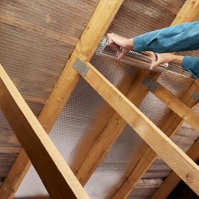Isolant radiateur et porte de garage MOTTEZ