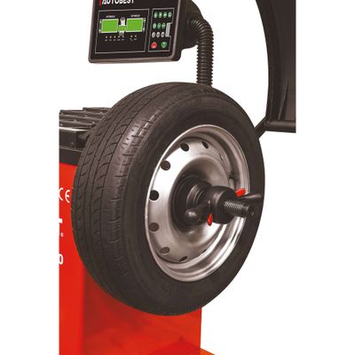 Équilibreuse de pneus avec écrou papillon à verrouillage rapide