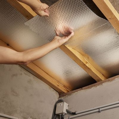 Isolant radiateur et porte de garage MOTTEZ