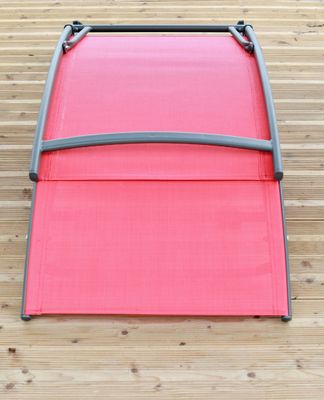 Bain de soleil acier blanc et textilène rouge