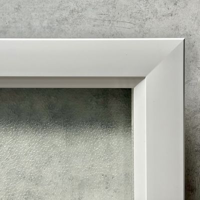 Porte de garage sectionnelle motorisée avec hublots l.240 x h.200 cm lisse blanche - SPADONE