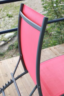 Bain de soleil acier blanc et textilène rouge